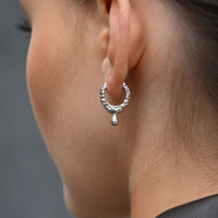 Culturesse Jaune Textured Teardrop Huggie Earrings (Silver) images 0